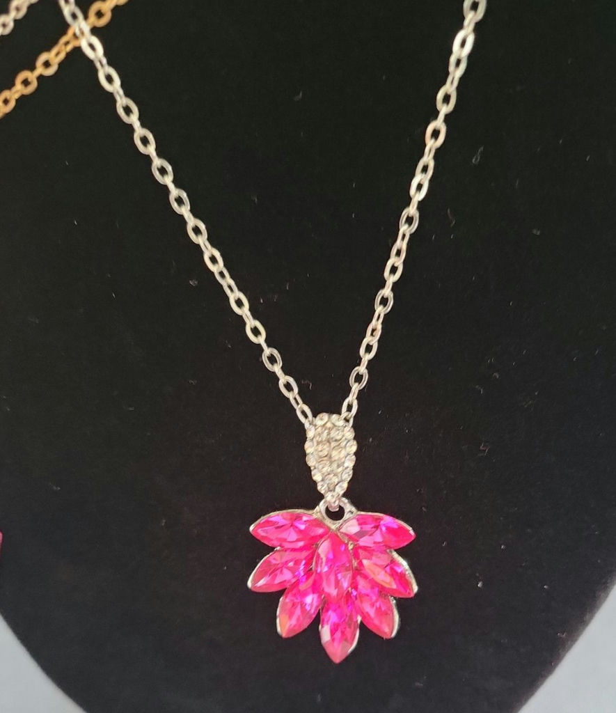 Pink fashion jewelry collection with floral motifs - image 6 of 15