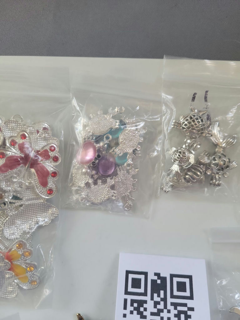 Assorted craft charms and embellishments - image 7 of 10