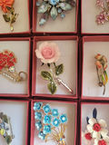 Assorted decorative brooch pins in display boxes - thumbnail 11 of 20