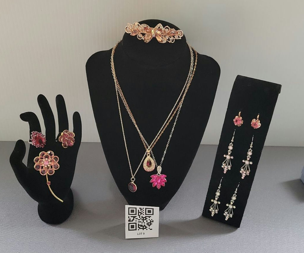 Pink fashion jewelry collection with floral motifs - image 1 of 15