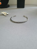 Assorted silver jewelry set: bangles, rings, necklace, and earrings - thumbnail 9 of 15