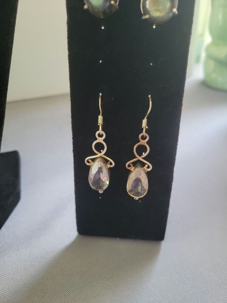 Assorted jewelry collection with pendants and earrings - image 11 of 12