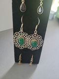 Assorted jewelry: necklace, bracelets, rings, and earrings - thumbnail 17 of 19