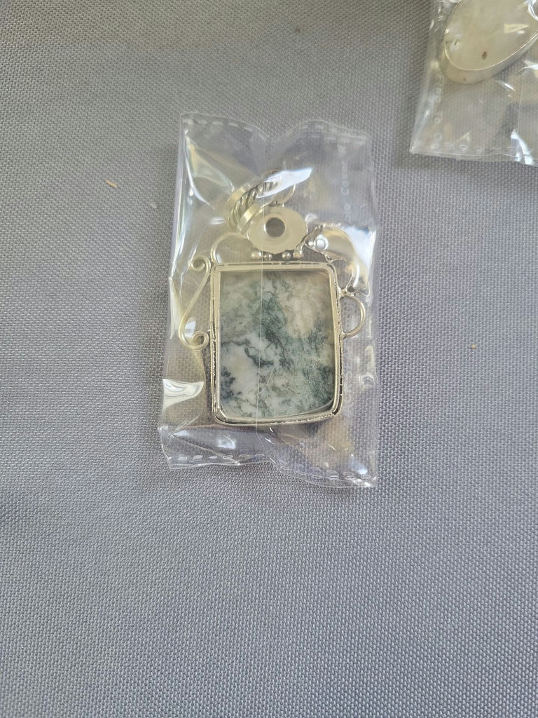 Assorted jewelry collection with pendants and earrings - image 6 of 12