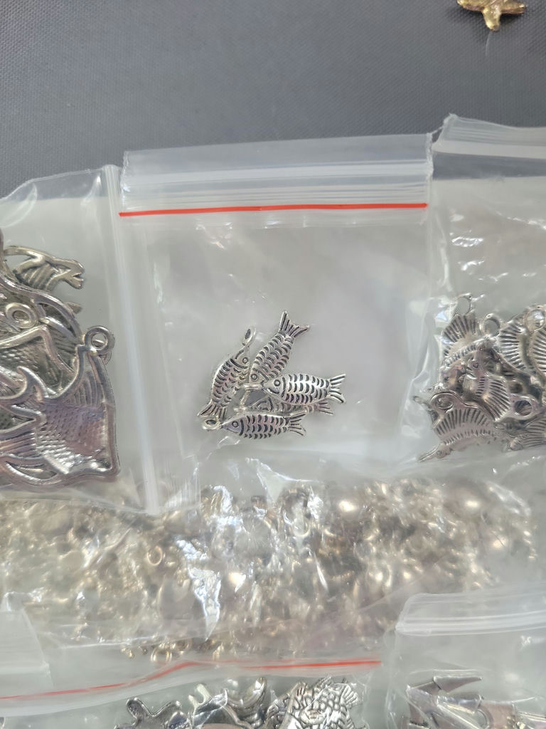 Assorted silver-tone metal charms and pendants - image 4 of 19