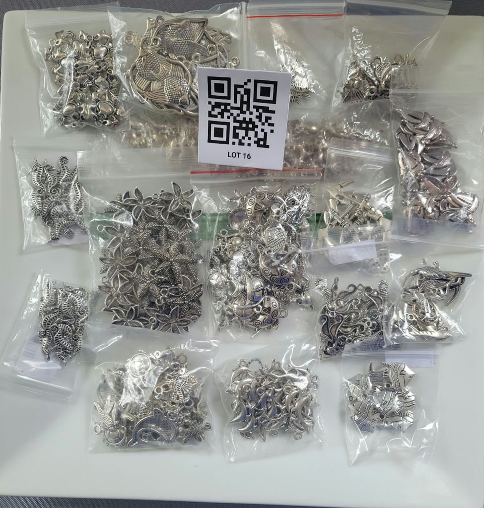 Assorted silver-tone metal charms and pendants - image 1 of 19