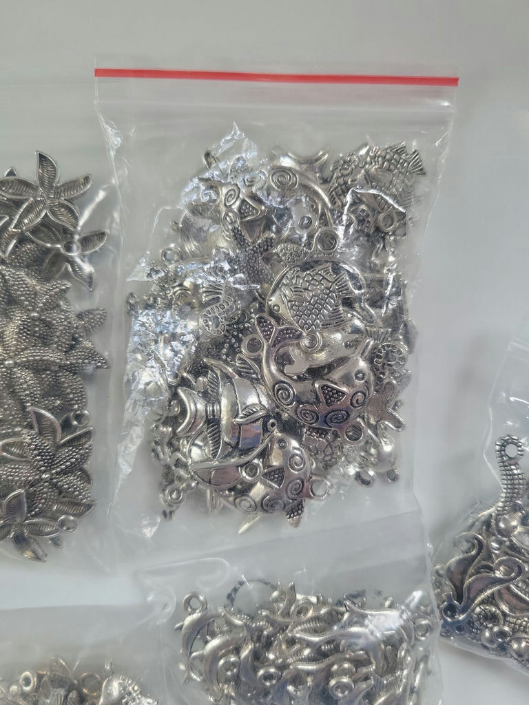 Assorted silver-tone metal charms and pendants - image 11 of 19