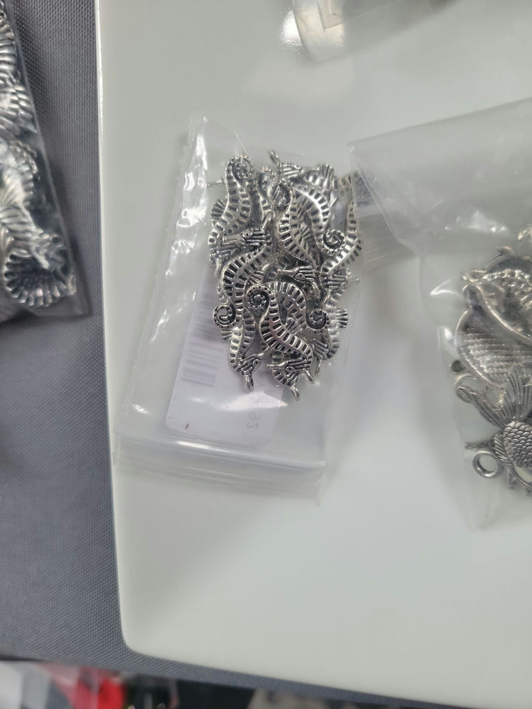 Assorted silver-tone metal charms and pendants - image 14 of 19