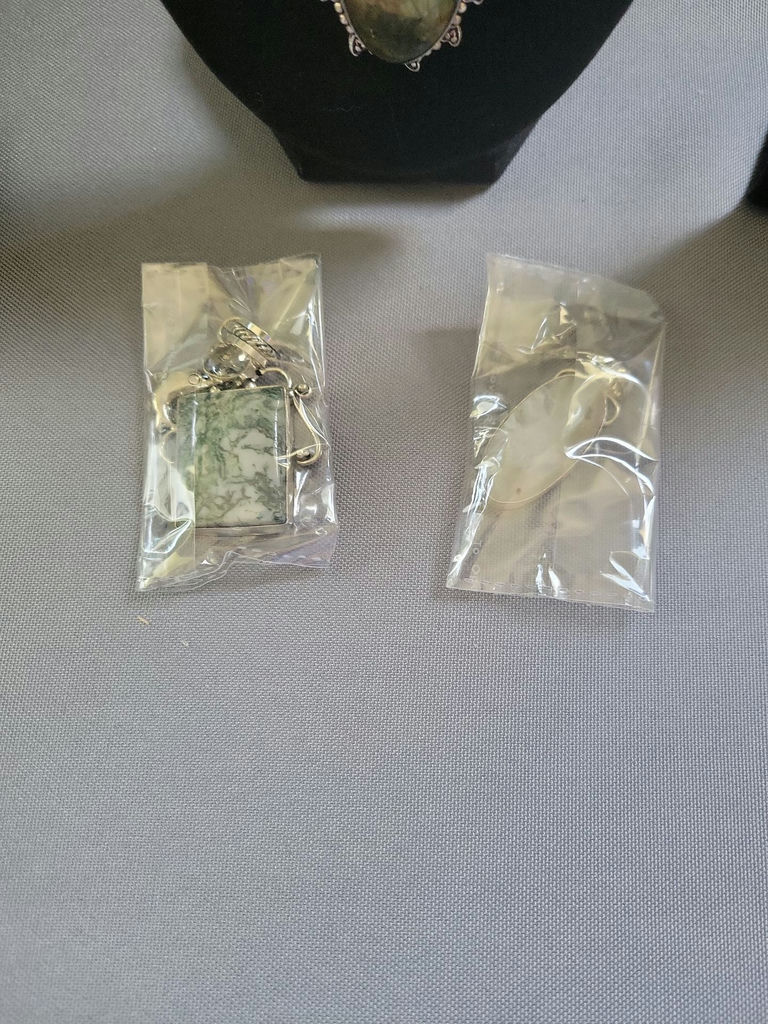 Assorted jewelry collection with pendants and earrings - image 5 of 12