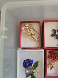 Assorted decorative brooch pins in display boxes - thumbnail 2 of 20