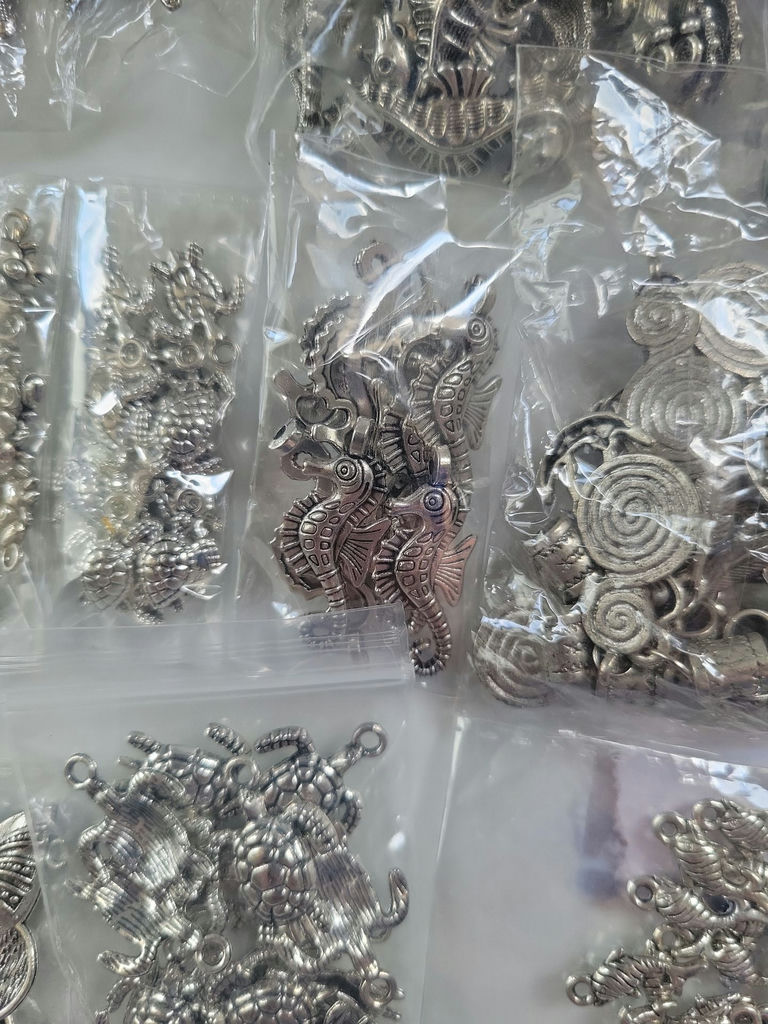 Assorted metal charms and jewelry findings - image 9 of 14