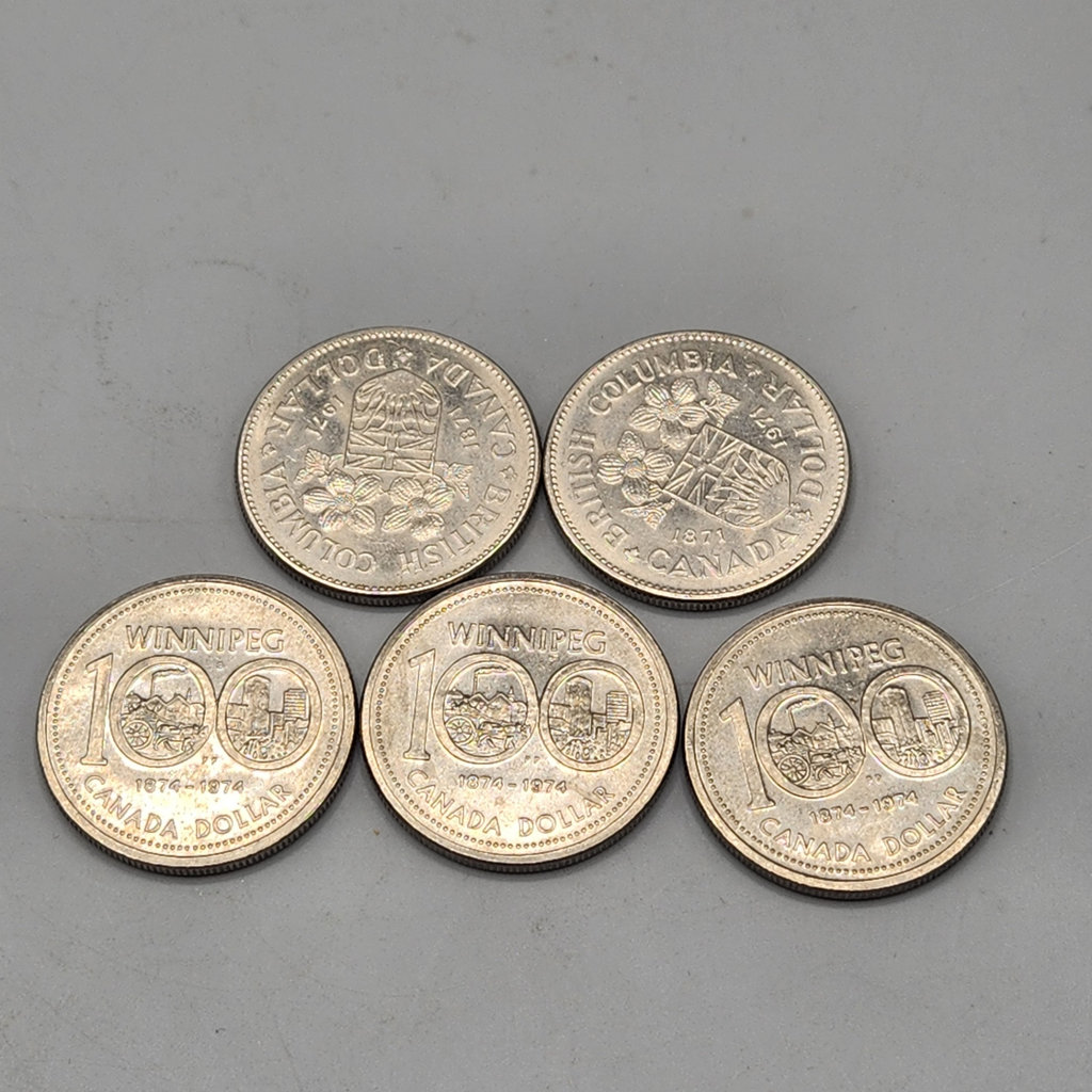 Winnepeg and BC Canada Dollar Coins - image 1 of 3