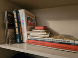 White bookshelf with books and board games - thumbnail 8 of 10