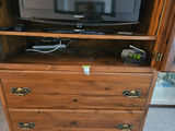 Large wooden armoire with carved crest and drawers - thumbnail 15 of 16