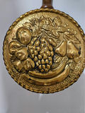 Pair of brass fruit-embossed medallions on wooden handles - thumbnail 3 of 5