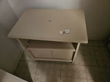 Beige freestanding cabinet with open shelf and double doors - thumbnail 1 of 6