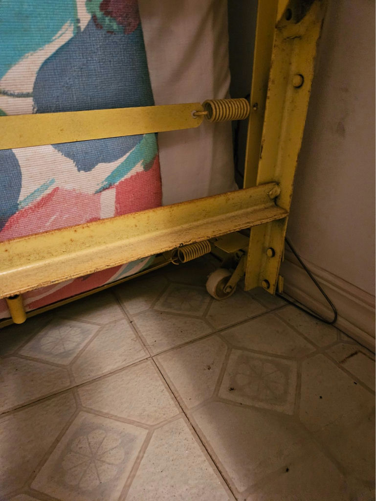 Yellow metal folding bed frame with mattress - image 5 of 7