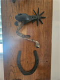 Wooden board with antique horse tack and metal hardware - thumbnail 4 of 5