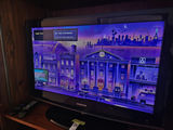 31" Samsung TV with Roku streaming device and remotes - thumbnail 1 of 7