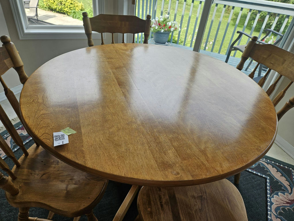40" Round wooden dining table with four spindle-back chairs - image 2 of 7