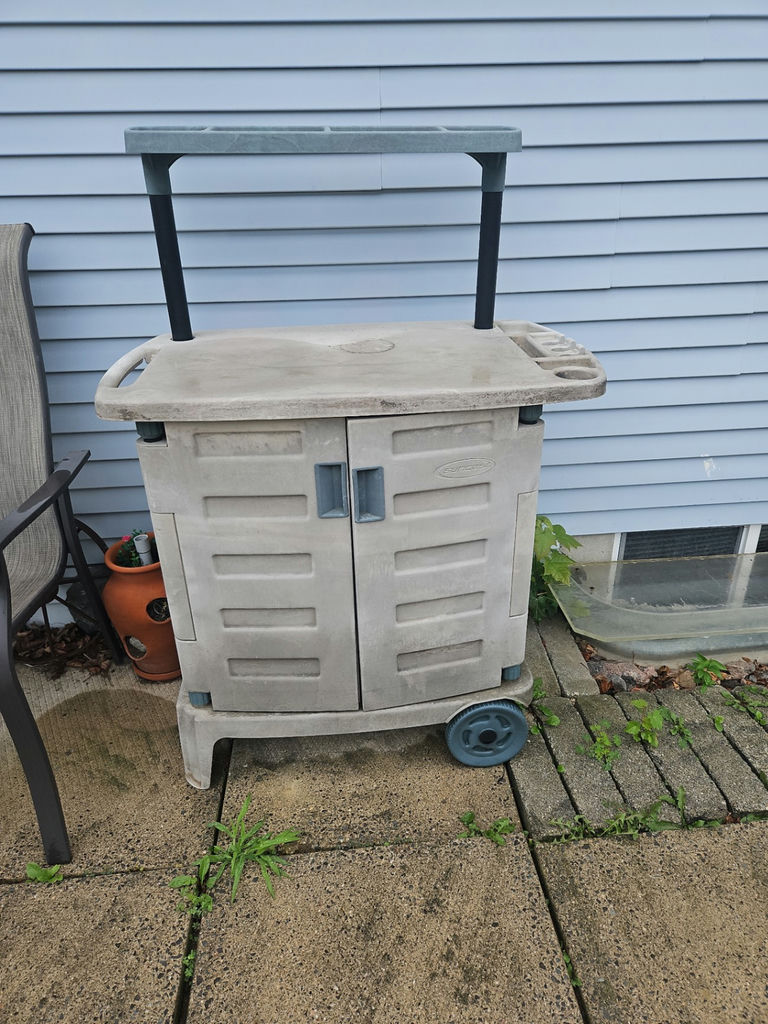 Plastic rolling utility cart/potting table with top tray and cabinet doors - image 1 of 7