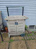 Plastic rolling utility cart/potting table with top tray and cabinet doors - thumbnail 1 of 7