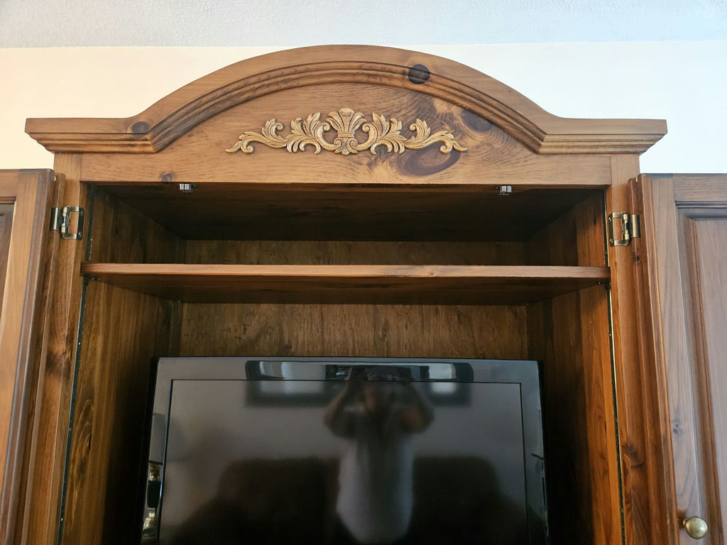Large wooden armoire with carved crest and drawers - image 16 of 16