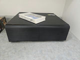 VHS tapes in a black storage cabinet with a Classical Guitar video box - thumbnail 5 of 6