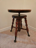 Round-top antique piano stool with castered legs - thumbnail 1 of 6