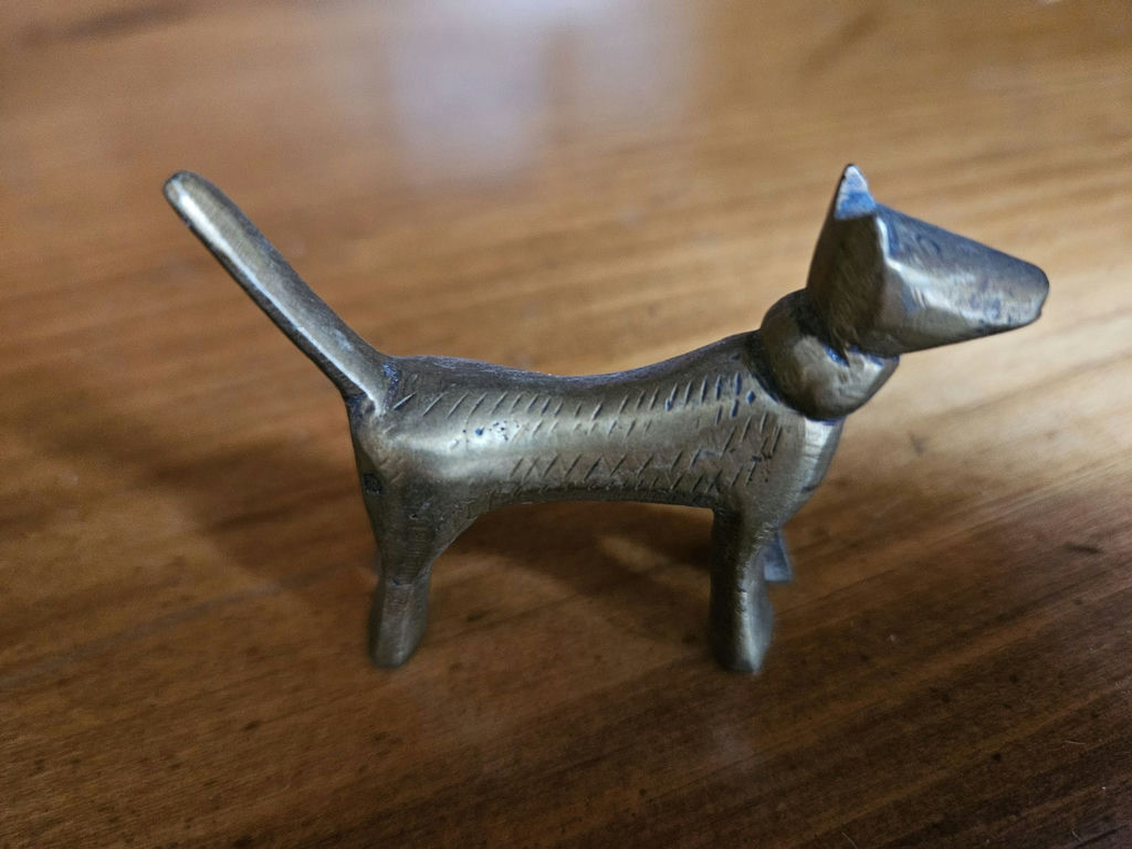 Small metal figurines: two seals, a seated female figure, and a dog - image 5 of 7