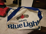 Brown leather Adidas duffel bag and Labatt's Blue Light promotional tote - thumbnail 2 of 6