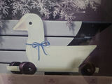 Framed art print of ducks and flowers in a cart - thumbnail 3 of 6