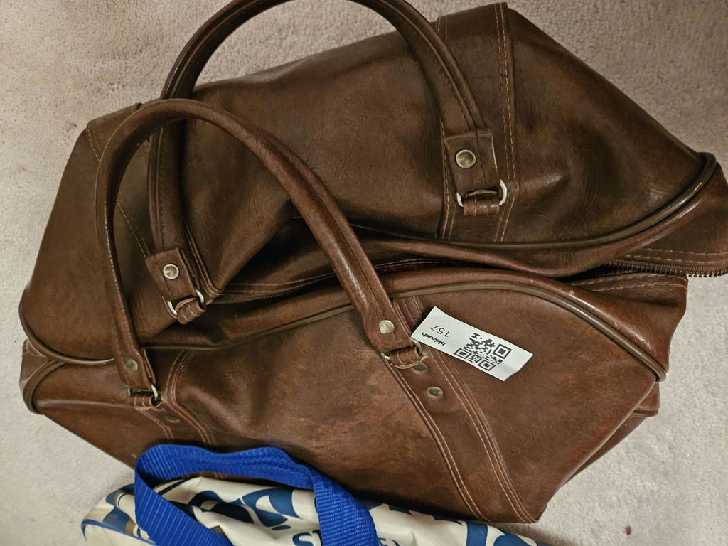 Brown leather Adidas duffel bag and Labatt's Blue Light promotional tote - image 1 of 6