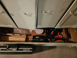 White storage cabinets with drawers and assorted tools - thumbnail 6 of 13