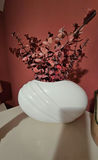 White ceramic vases, a carved tiki statue, a rope-handled jar, and a digital clock - thumbnail 7 of 7