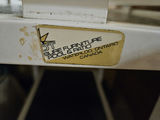 Assorted furniture pieces: white glass-top display tables, a console table, and a wooden dresser - thumbnail 4 of 16