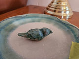 Blue-green glazed ceramic plate with small bird sculpture - thumbnail 4 of 8