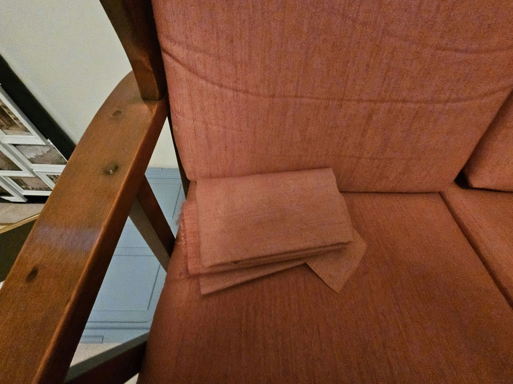 Vintage wooden-framed sofa with coral upholstery and matching armchair - image 10 of 13