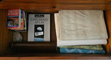 Universal Atlas and Webster's Dictionary with folded fabrics - thumbnail 1 of 7