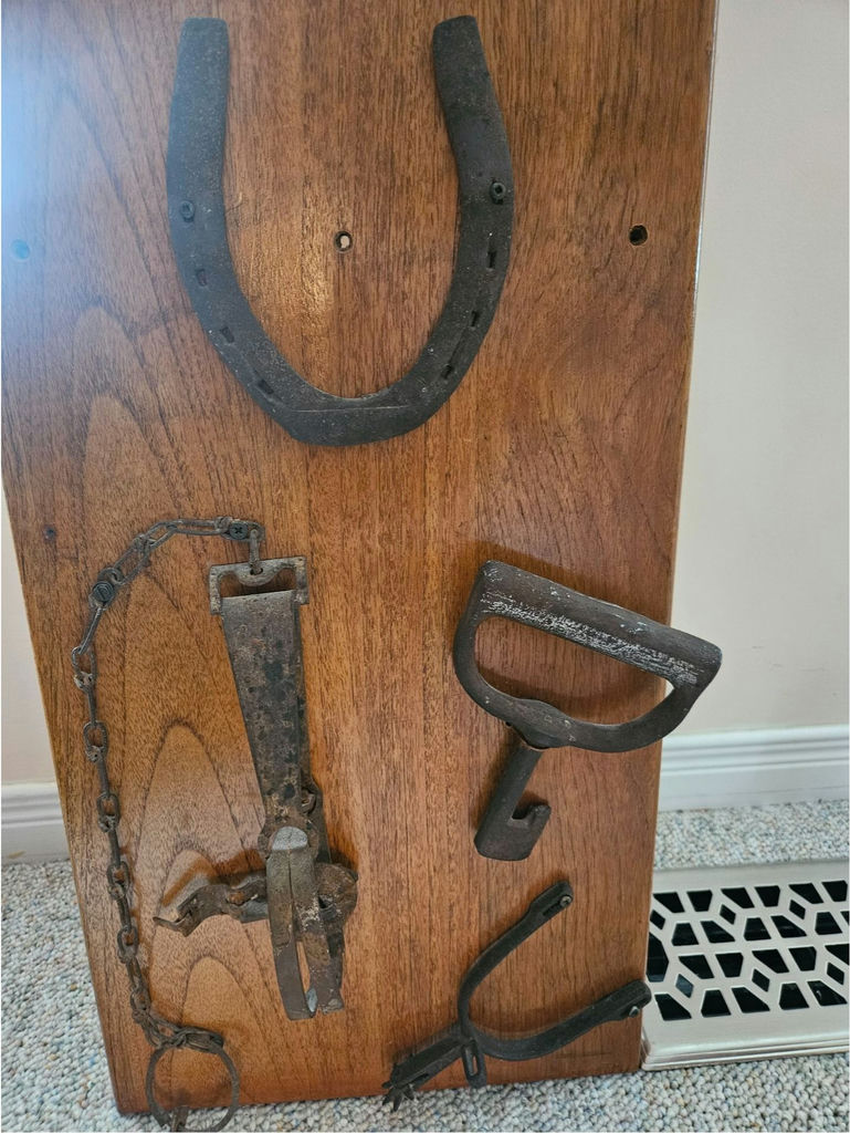 Wooden board with antique horse tack and metal hardware - image 5 of 5