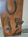 Wooden board with antique horse tack and metal hardware - thumbnail 5 of 5