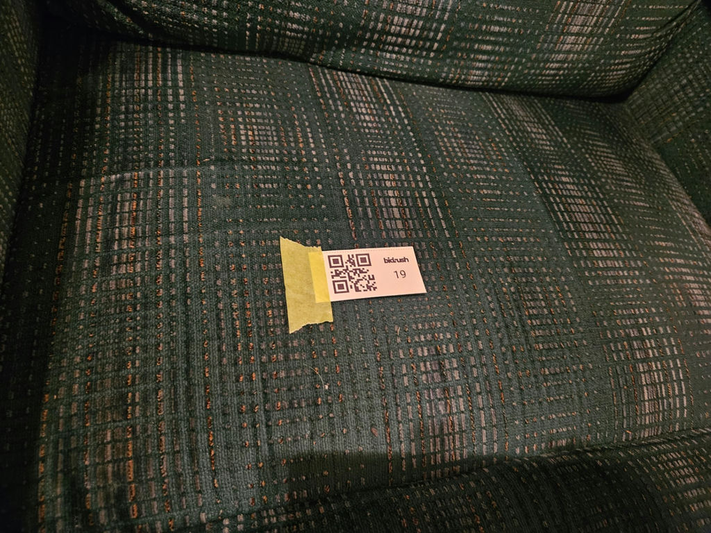 Green fabric recliner chair with power adapter - image 10 of 10