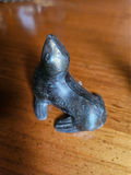 Small metal figurines: two seals, a seated female figure, and a dog - thumbnail 3 of 7