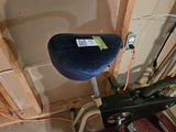 Vintage stationary exercise bike with blue seat and dual-dial console - thumbnail 2 of 4