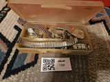 Assorted metal-band wristwatches in a plastic case - thumbnail 1 of 3