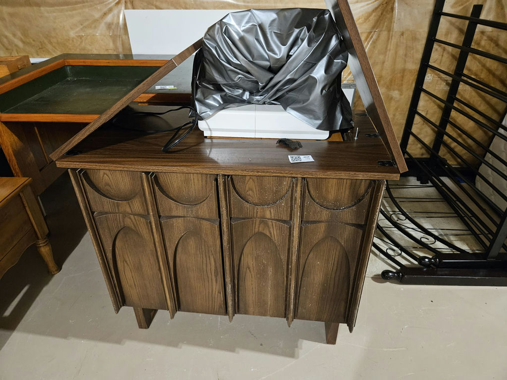 Sewing machine in Mid Century Modernwooden cabinet with sewing supplies - image 1 of 11