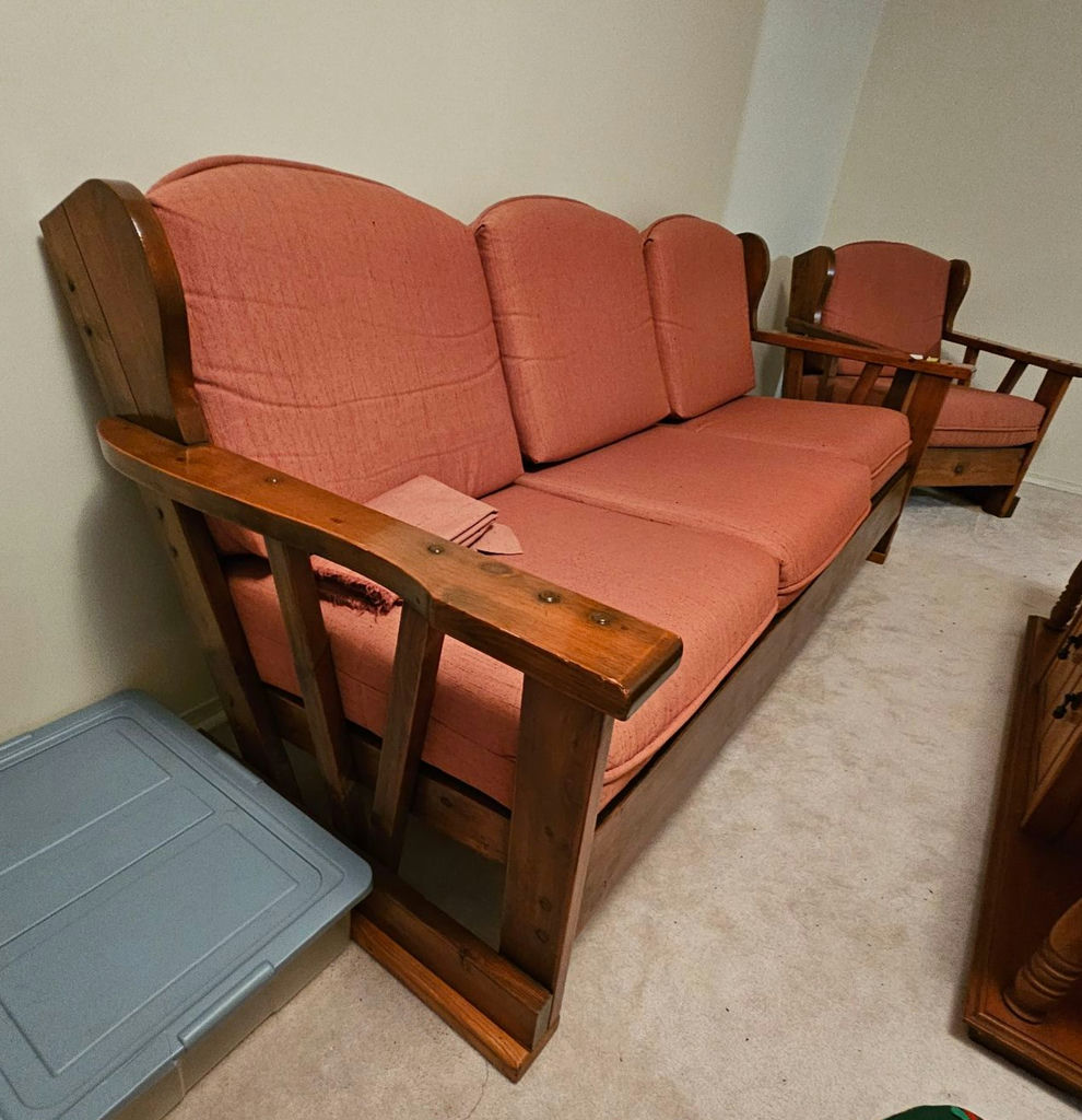 Vintage wooden-framed sofa with coral upholstery and matching armchair - image 1 of 13