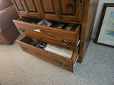 Large wooden armoire with carved crest and drawers - thumbnail 11 of 16
