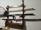 Wall-mounted fishing rod rack with reels, net, and tackle cabinet - thumbnail 5 of 5