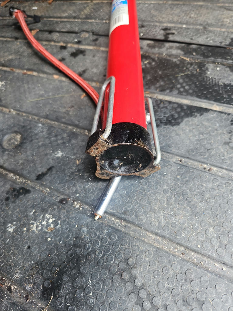 Red handheld manual air pump with hose - image 5 of 8